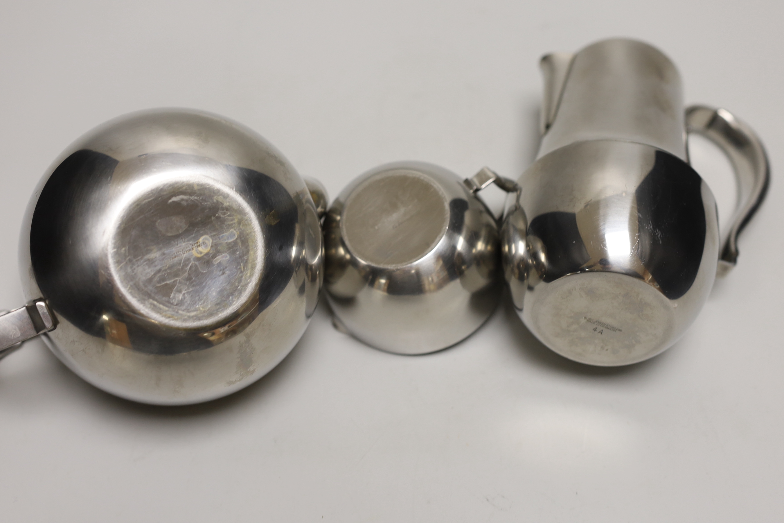 A Georg Jensen stainless steel three piece teaset